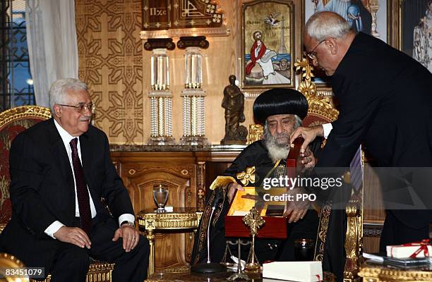 In this handout image provided by the Palestinian Press Office , Palestinian president Mahmoud Abbas meets His Holiness Pope Shenouda III, Pope of...