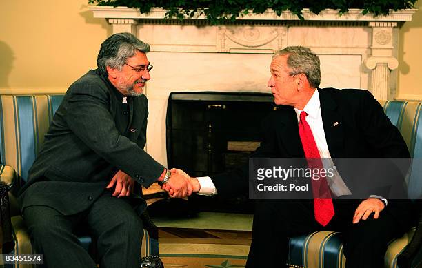 President George W. Bush meets with Paraguay President Fernando Lugo in the Oval Office of the White House on October 27, 2008. Lugo was sworn in as...