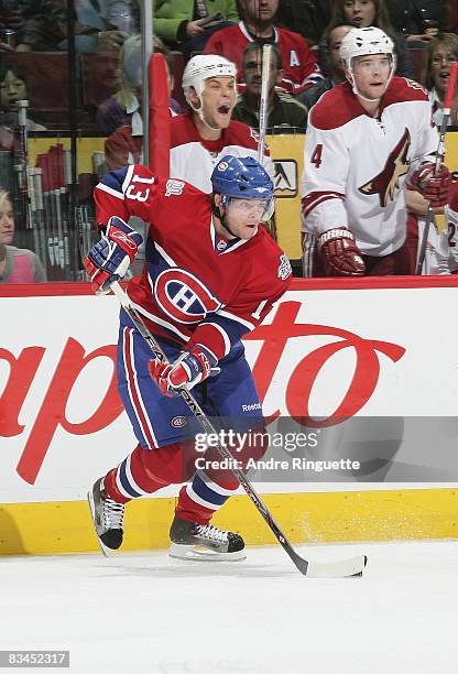 Alex Tanguay of the Montreal Canadiens stickhandles the puck against the Phoenix Coyotes at the Bell Centre on October 18, 2008 in Montreal, Quebec,...