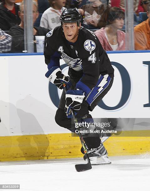 Vincent Lecavalier of the Tampa Bay Lightning skates with the puck against the San Jose Sharks at the St. Pete Times Forum on October 25, 2008 in...