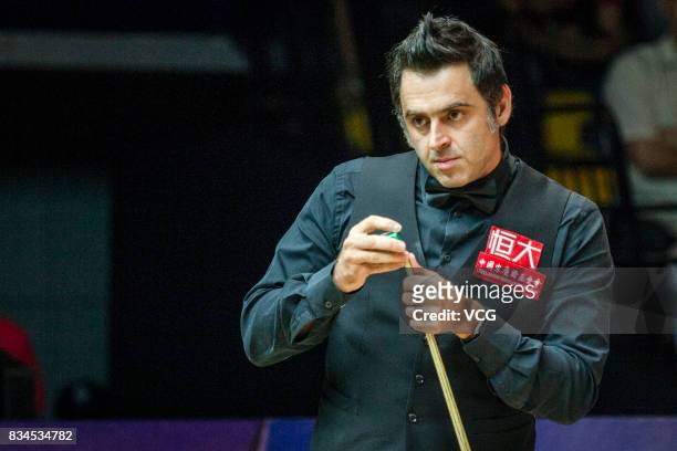 Ronnie O'Sullivan of England reacts during his second round match against David Gilbert of England on day three of Evergrande 2017 World Snooker...