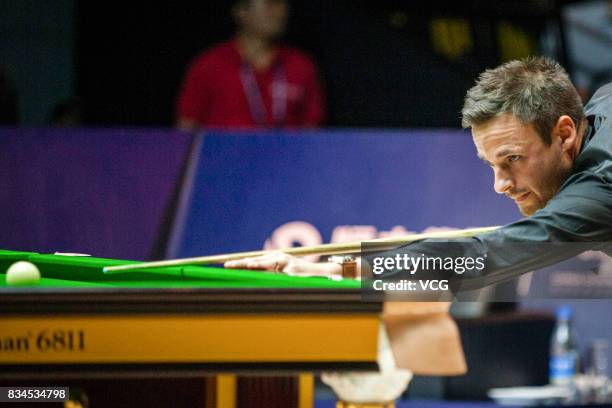 David Gilbert of England plays a shot during his second round match against Ronnie O'Sullivan of England on day three of Evergrande 2017 World...