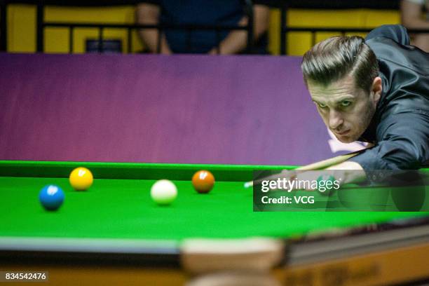 Mark Selby of England plays a shot during his second round match against Zhou Yuelong of China on day three of Evergrande 2017 World Snooker China...