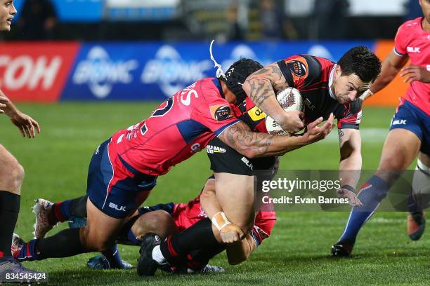 Trael Joss of Tasman is tackles Rob Thompson of Canterbury during the Mitre 10 Cup round one match between Tasman and Canterbury at Trafalgar Park on...