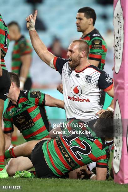 Simon Mannering of the Warriors celebrates scoring a try during the round 24 NRL match between the South Sydney Rabbitohs and the New Zealand...