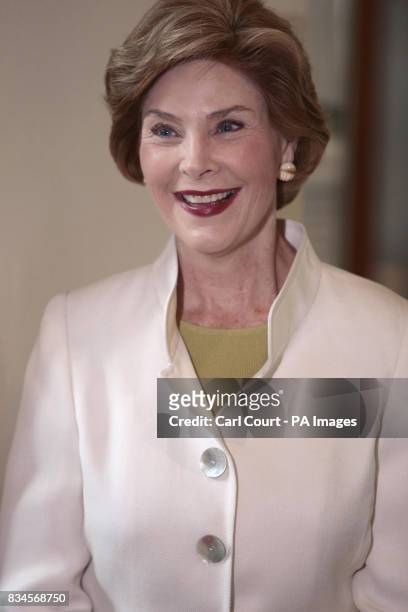 America's First Lady, Laura Bush, smiles during her tour of the British Museum, London.