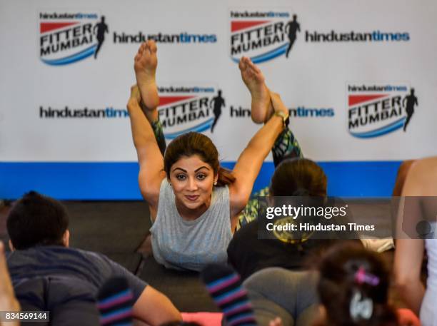 Bollywood actor Shilpa Shetty Kundra teaches yoga during the Hindustan Times Fitter Mumbai Campaign at Gold's Gym, Bandra, on August 12, 2017 in...