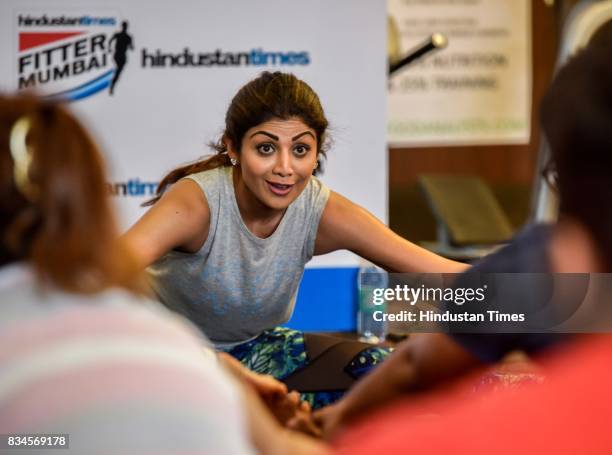 Bollywood actor Shilpa Shetty Kundra teaches yoga during the Hindustan Times Fitter Mumbai Campaign at Gold's Gym, Bandra, on August 12, 2017 in...