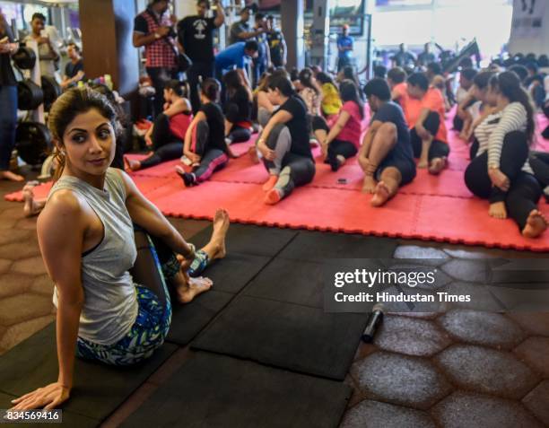 Bollywood actor Shilpa Shetty Kundra teaches yoga during the Hindustan Times Fitter Mumbai Campaign at Gold's Gym, Bandra, on August 12, 2017 in...