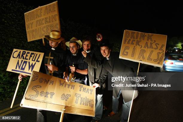 Father Ted fans protest at the nudity as hundreds of volunteers strip naked in Blarney Castle in Cork for photographer Spencer Tunick.