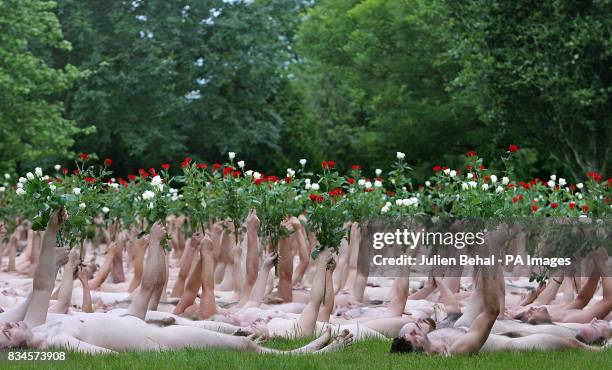 Hundreds of volunteers strip naked in Blarney Castle in Cork for photographer Spencer Tunick.