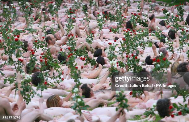 Hundreds of volunteers strip naked in Blarney Castle in Cork for photographer Spencer Tunick.