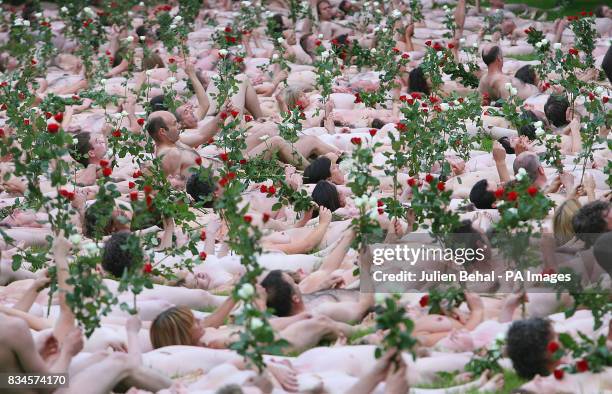 Hundreds of volunteers strip naked in Blarney Castle in Cork for photographer Spencer Tunick.