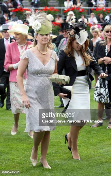 Countess Of Wessex and Princess Beatrice leave the parade ring on the first day at Ascot Racecourse, Berkshire.