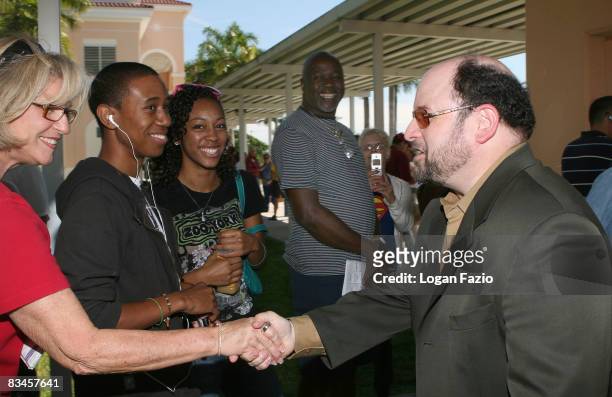 Actor Jason Alexander greets unsuspecting fans who were in line to vote at an Early Vote For Change Rally in support of Barack Obama at Silver Lakes...