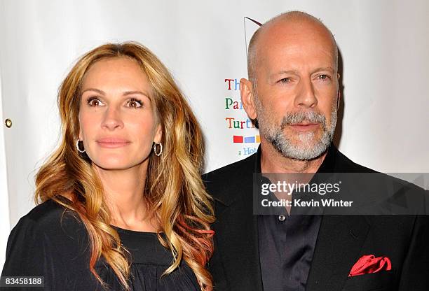 Actress Julia Roberts and actor Bruce Willis arrive at the reading of "The World Of Nick Adams" to honor Paul Newman held at Davies Symphony Hall on...