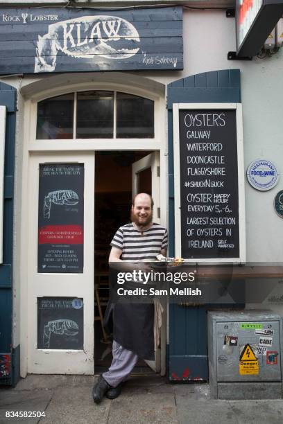 Seafood chef from Klaw restaurant holding a seafood platter on 3rd April 2017 in Dublin, Republic of Ireland. Dublin is the largest city and capital...