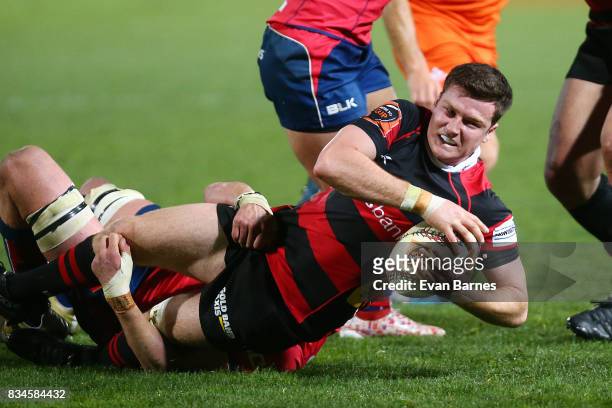 Jack Stratton of Canterbury is tackled during the during the Mitre 10 Cup round one match between Tasman and Canterbury at Trafalgar Park on August...