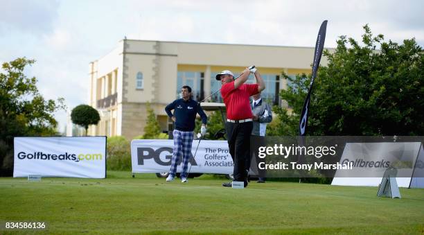 Richard O'Hanlon of St Kew Golf Club watches Michael Watson of Wessex Golf Centre play his first shot on the 1st tee during the Golfbreaks.com PGA...