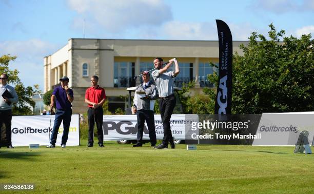 Barry Forster of North Wilts Golf Club plays his first shot on the 1st tee during the Golfbreaks.com PGA Fourball Championship - Day 3 at Whittlebury...