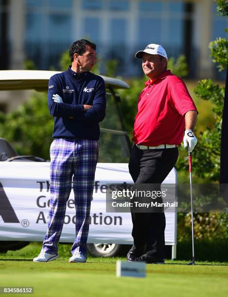 Richard O'Hanlon of St Kew Golf Club and Michael Watson of Wessex Golf Centre wait to play their first shots on the 1st tee during the Golfbreaks.com...