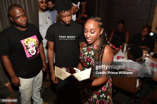 Jason Riddick, 21 Savage and Rachel Jackson attend a an Ascap for Dinnnr for 21 Savage at KR Steakhouse on August 17, 2017 in Atlanta, Georgia.