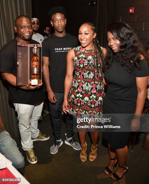 Jason Riddick, 21 Savage and Rachel Jackson attend a an Ascap for Dinnnr for 21 Savage at KR Steakhouse on August 17, 2017 in Atlanta, Georgia.