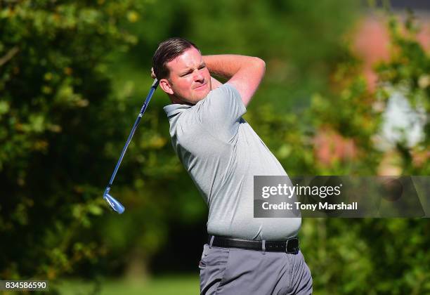 Steven Quinlan of Halpenny Golf Club plays his first shot on the 1st tee during the Golfbreaks.com PGA Fourball Championship - Day 3 at Whittlebury...