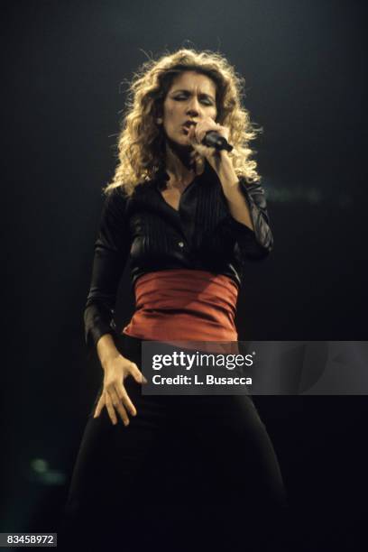 Canadian vocalist Celine Dion performs in concert during Hirshfeld Drawing function at Madison Square Garden, New York, New York, September 3, 1998.