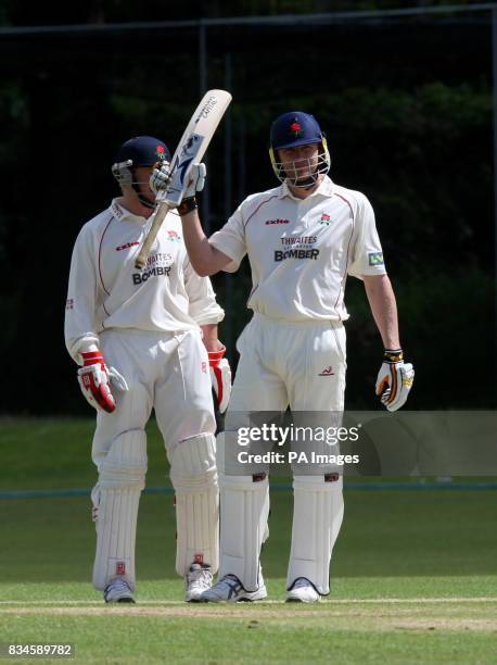 Lancashire's Andrew Flintoff celebrates reaching his half century during the Second XI County Championship match at Alderley Edge, Cheshire.
