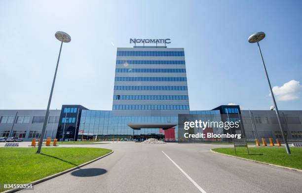 The company logo of Novomatic sits on top of the Novomatic AG headquarters in Gumpoldskirchen, Austria, on Thursday, Aug. 17, 2017. Novomatic is...