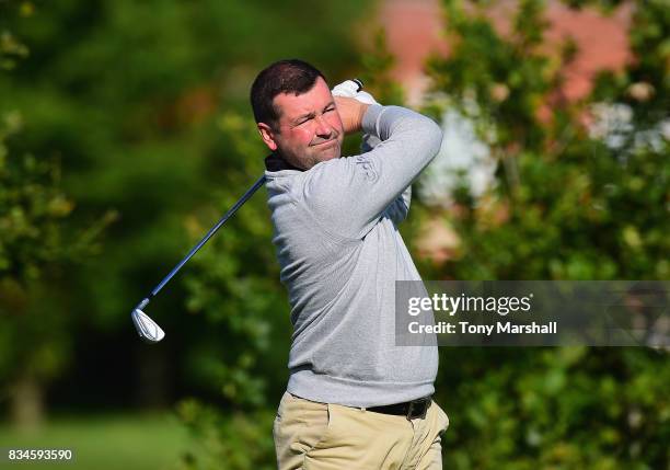 Mark Hancock of Stand Golf Club plays his first shot on the 1st tee during the Golfbreaks.com PGA Fourball Championship - Day 3 at Whittlebury Park...