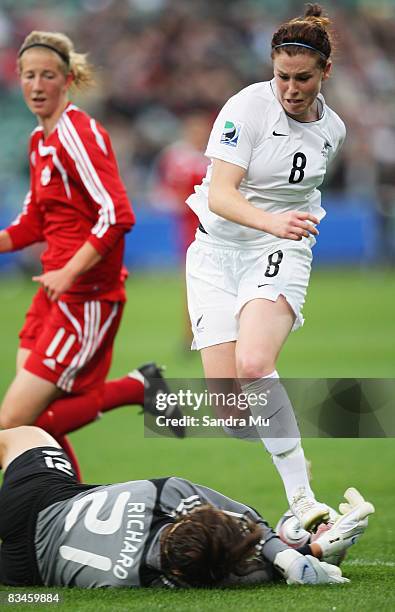 Genevieve Richard of Canada stops the ball short of Sarah McLaughlin of New Zealand during the FIFA U-17 Women`s World Cup match between New Zealand...