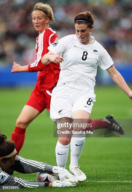 Genevieve Richard of Canada stops the ball short of Sarah McLaughlin of New Zealand during the FIFA U-17 Women`s World Cup match between New Zealand...