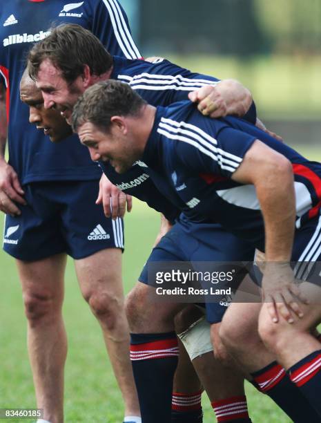 Neemia Tialata, Andrew Hore and Tony Woodcock pack down in the scrum during a New Zealand All Blacks training session at So Kon Po Sports Ground on...
