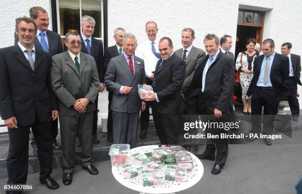 Prince of Wales with Cambrian Mountain Initiative farmers & steering group members with some of the Cambrian Mountains produce at Tyllwyd Farm,...