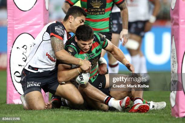 Kyle Turner of the Rabbitohs is held up over the try line during the round 24 NRL match between the South Sydney Rabbitohs and the New Zealand...