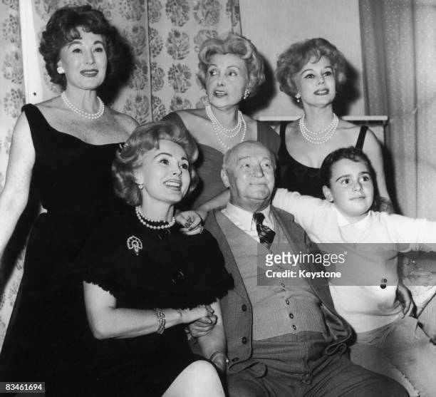 Hungarian actress and socialite Zsa Zsa Gabor with her family at the Hotel Sacher in Vienna, October 1958. Standing, left to right, Zsa Zsa's sister,...