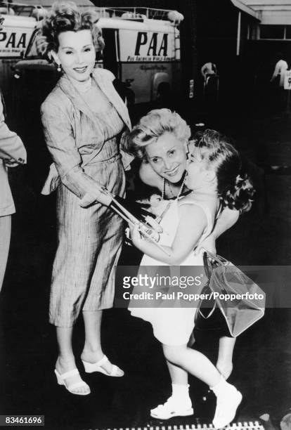 Hungarian actress Zsa Zsa Gabor looks on as her mother Jolie Gabor says goodbye to Zsa Zsa�s daughter Constance Francesca Hilton at John F. Kennedy...