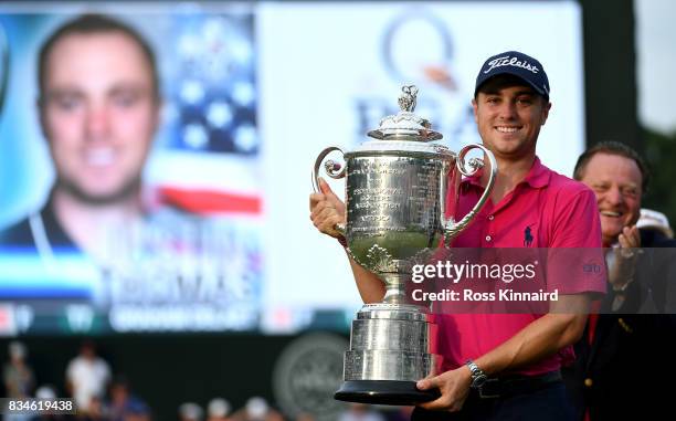 Justin Thomas of the United States poses with the Wanamaker Trophy after winning the 2017 PGA Championship during the final round at Quail Hollow...