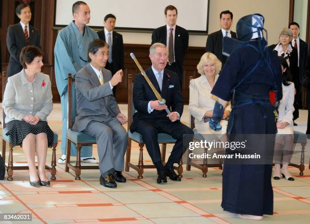 Prince Charles, Prince of Wales receives a bamboo sword from Kendo sword fighter at the Emerging Museum of Science and Innovation on October 28, 2008...