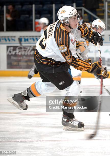 Scott Glennie of the Brandon Wheat Kings takes a shot on net during warm up at the Kelowna Rockets on October 25, 2008 at Prospera Place in Kelowna,...