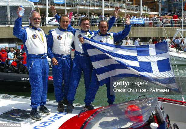 Year old Dag Pike from Bristol celebrates winning the 2008 Round Britain Offshore Powerboat Race with his Greek team-mates, Vassilis Pateras , Panos...