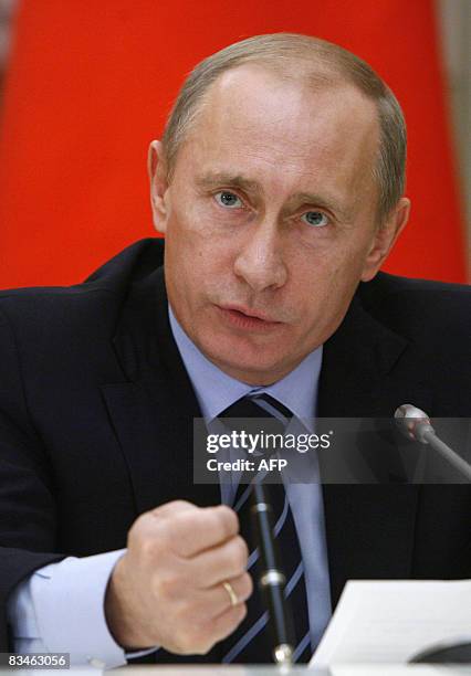 Russian Prime Minister Vladimir Putin speaks during a meeting with unseen Chinese Premier Wen Jiabao in Moscow on October 28, 2008. Russia and China...