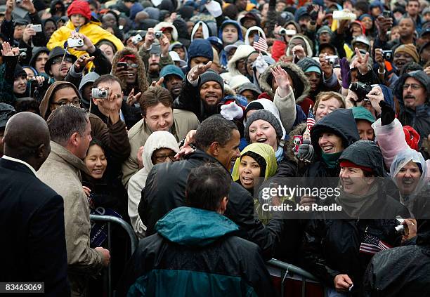 Democratic presidential nominee U.S. Sen. Barack Obama shakes hands with people during a campaign rally at Widener University Main Quad October 28,...