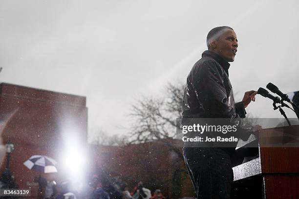 Democratic presidential nominee U.S. Sen. Barack Obama speaks in the rain during a campaign rally at Widener University Main Quad October 28, 2008 in...