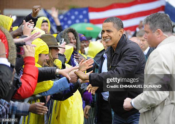 Democratic presidential candidate Illinois Senator Barack Obama greets supporters during a rally at Widener University in Chester, Pennsylvania,...