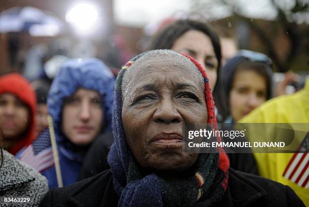 Democratic presidential candidate Illinois Senator Barack Obama supporters stand in the cold rain during a rally at Widener University in Chester,...