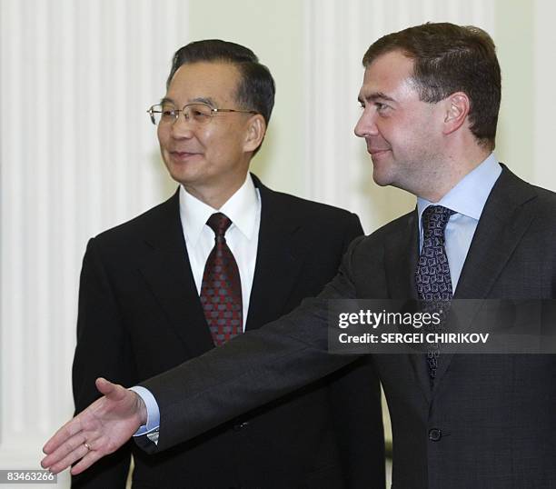 Russian President Dmitry Mevedev welcomes Chinese Prime Minister Wen Jiabao and members of the Chinese delegation during their meeting in the Kremlin...