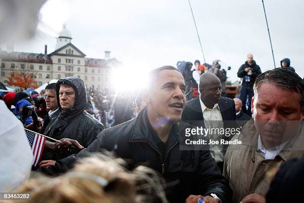 Democratic presidential nominee U.S. Sen. Barack Obama shakes hands with people during a campaign rally at Widener University Main Quad October 28,...